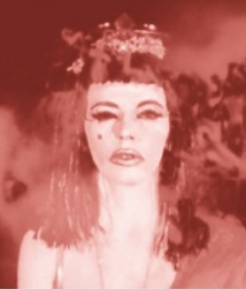 Marjorie Cameron — red-tinted portrait with headdress