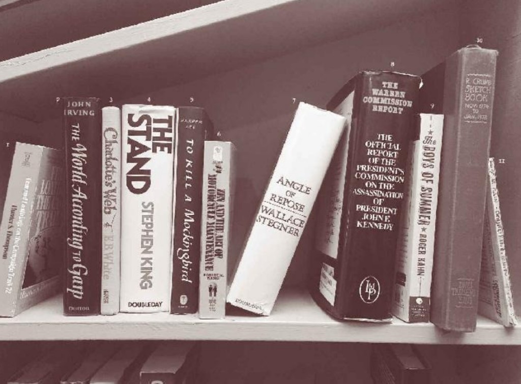 Bookhouse shelf of eleven numbered favorite tomes — Archivist plate