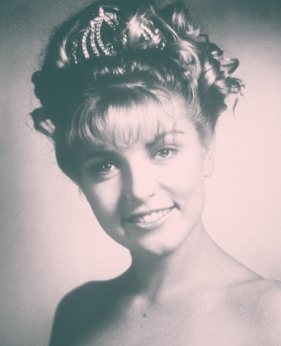 Laura Palmer prom portrait — tiara, smile, formal updo
