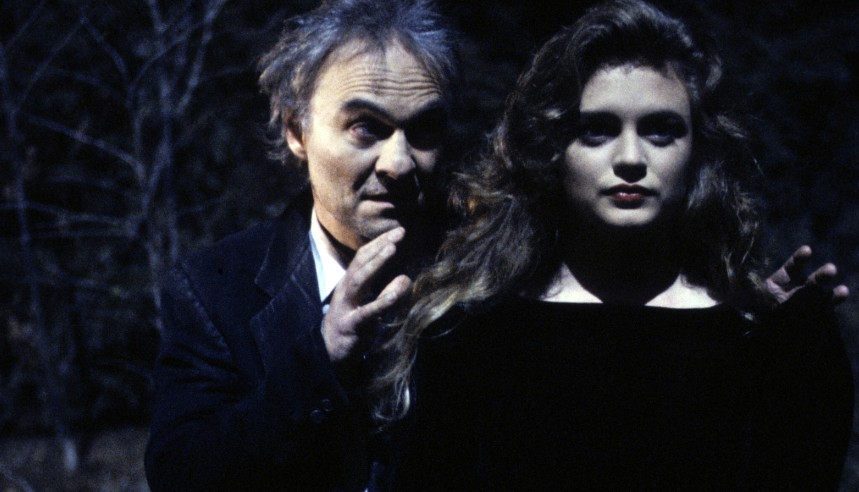 Annie Blackburn and Windom Earle in the woods at night