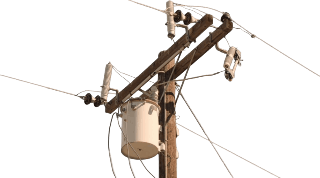 Utility pole with transformer against black