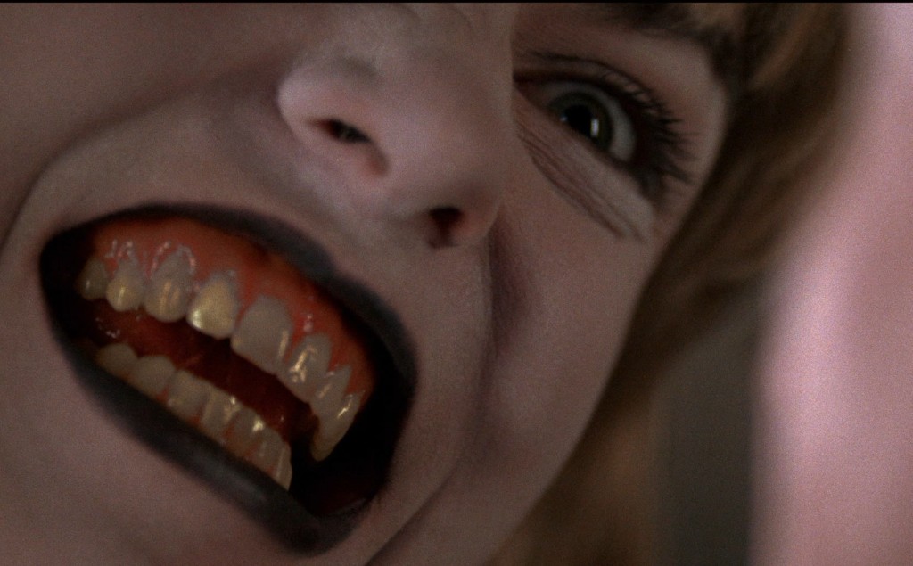 Extreme close-up of Laura Palmer's face - something else surfaces in front of Harold