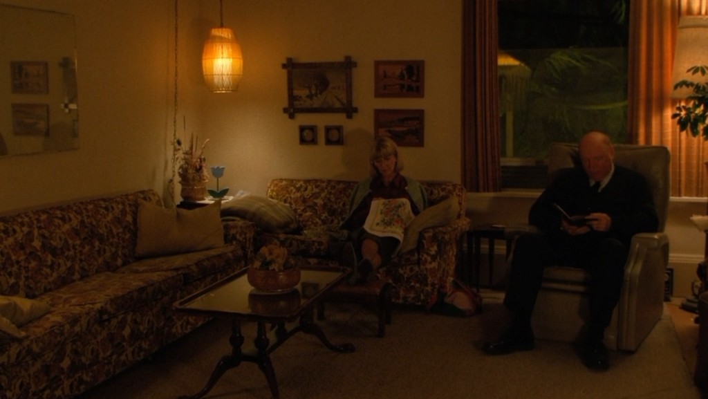 Major Garland Briggs reading Revelation to Betty in the living room