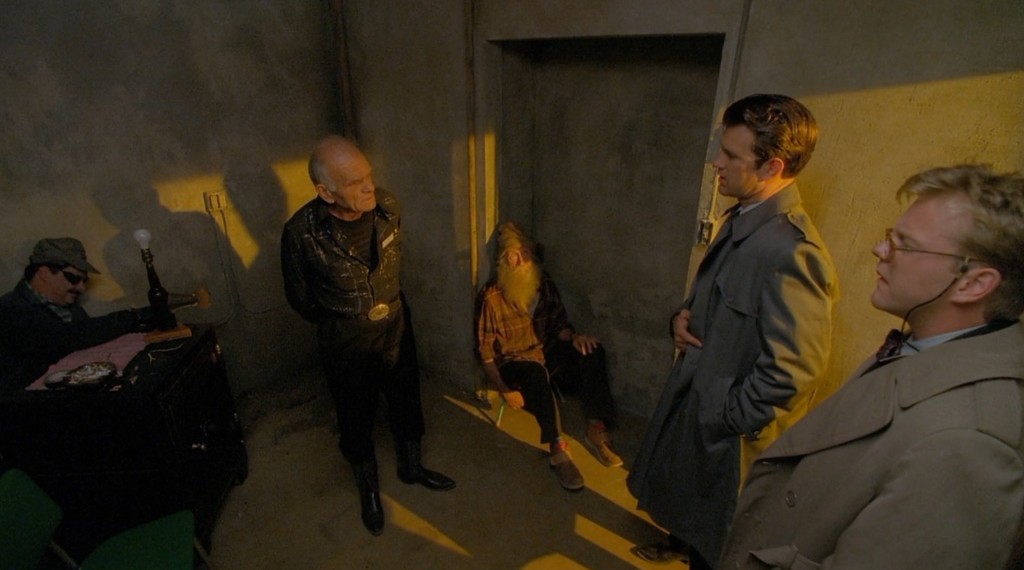 Desmond and Stanley facing the Jumping Man and a Woodsman