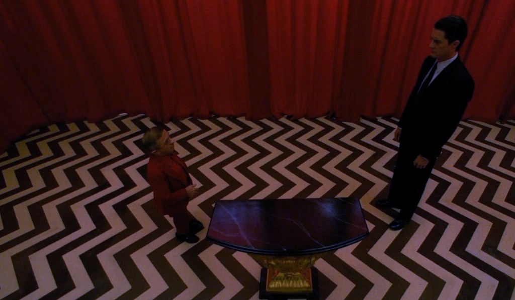 Cooper and the Man from Another Place in the Red Room - chevron floor, red curtains